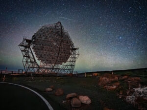 Long-exposure portrait of a large segmented-mirror Cherenkov telescope under a star-filled sky, Roque de los Muchachos observatory, La Palma.