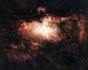 Deep-sky telescope image of the Eagle Nebula (M16), an emission nebula in Serpens, the Pillars of Creation visible at its glowing centre.
